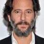 Henry Ian Cusick is Russ Taylor