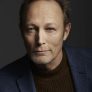 Lars Mikkelsen is Thøger Jensen