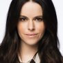 Emily Hampshire is Jennifer Goines