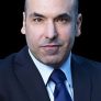 Rick Hoffman is Louis Litt