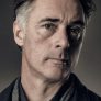 Greg Wise is Warren Schifford