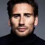 Edward Holcroft is Dr. Simon Jordan