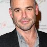 Paul Blackthorne is Tom Hackett