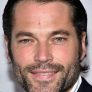 Tim Rozon is Luke Roman