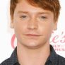 Calum Worthy is Taylor Travis (voice)