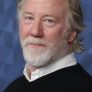 Timothy Busfield is Henry Roswell