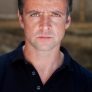 Richard Harrington is Aron Morgan