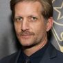 Paul Sparks is Howard