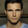 Robbie Amell is Nathan Brown