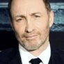 Michael McElhatton is CC Ronald Gregory